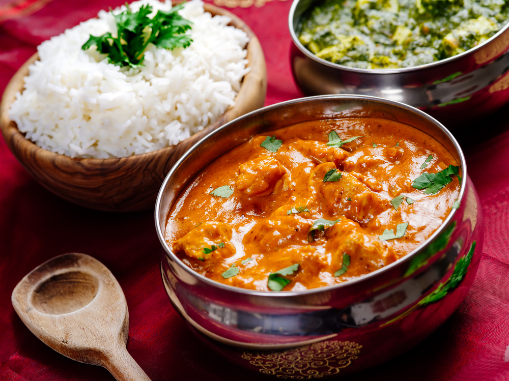 Indian meal of Butter Chicken, rice and Saag Paneer