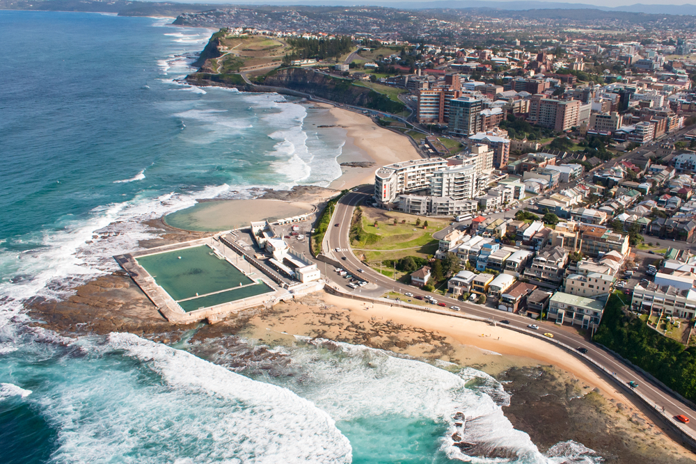 Newcastle NSW aerial shot of beach, ocean pool and CBD.