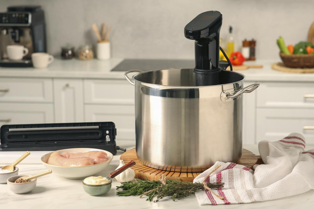 What is Sous VIde? Immersion Circulator in a pot in a kitchen